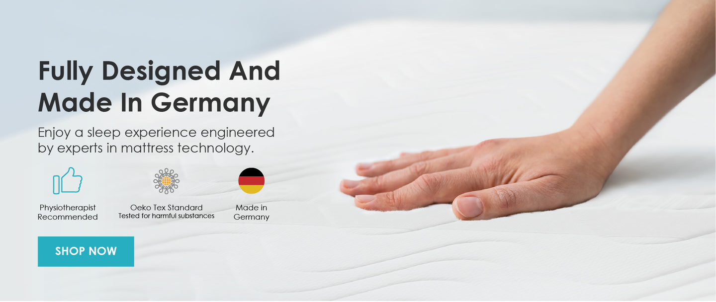 Hands touching a soft mattress made in Germany